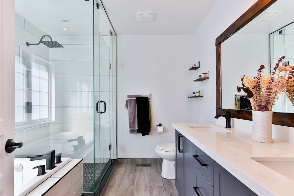Modern bathroom with a shower, bath and plumbing fixtures